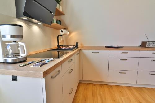 Langeoog Ferienwohnung Haus am Wind / am Strand - 3 - Küchezeile