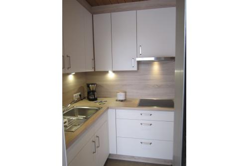 Langeoog Ferienwohnung Haus am Wind / am Strand - 5 - Moderne Küchenzeile