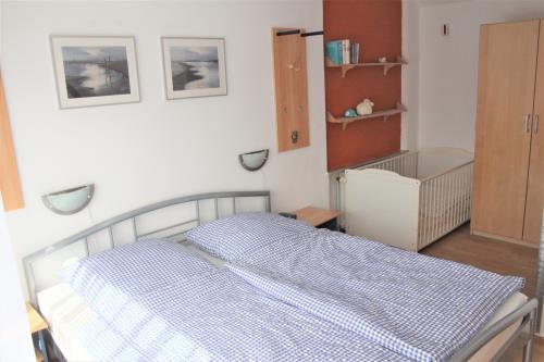 Langeoog Ferienhaus Hus Dreemaster  - 1 - Schlafzimmer Eltern