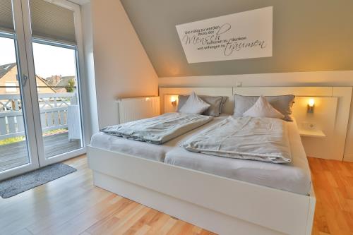 Langeoog Ferienhaus Huus Agena / Huus Osterloog - Inseltraum - Inseltraum