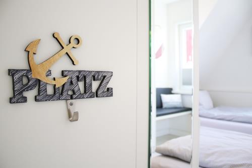 Langeoog Ferienhaus Huus Agena / Huus Osterloog - Ostwohnung