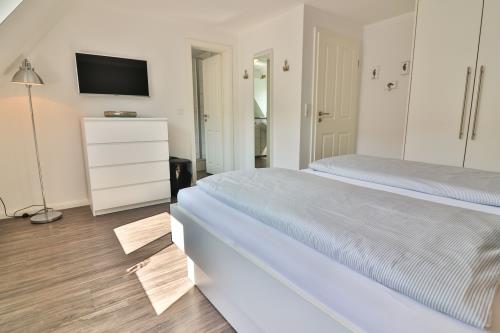 Langeoog Ferienhaus Huus Agena / Huus Osterloog - TüskenTid - Tüsken Tiden