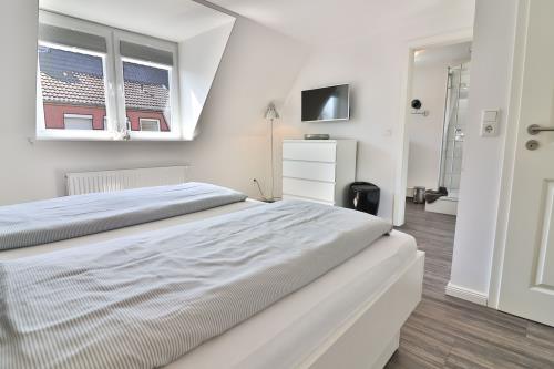 Langeoog Ferienhaus Huus Agena / Huus Osterloog - TüskenTid - Tüsken Tiden