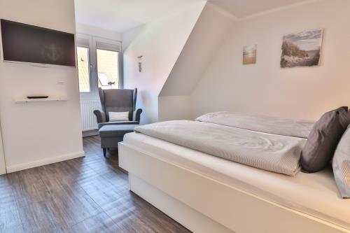 Langeoog Ferienhaus Huus Agena / Huus Osterloog - TüskenTid - Tüsken Tiden