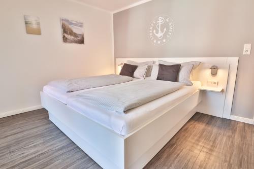 Langeoog Ferienhaus Huus Agena / Huus Osterloog - TüskenTid - Tüsken Tiden