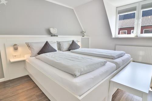 Langeoog Ferienhaus Huus Osterloog - Tüsken Tiden - Tüsken Tiden