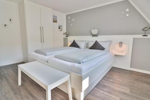 Langeoog Ferienhaus Huus Osterloog - Tüsken Tiden - Tüsken Tiden