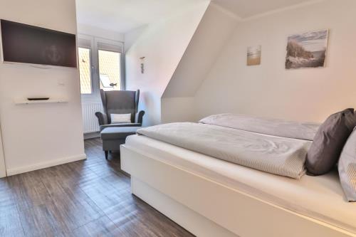 Langeoog Ferienhaus Huus Osterloog - Tüsken Tiden - Tüsken Tiden