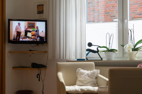 Langeoog Ferienwohnung Inselhaus Ute - Fuchsie - Fuchsie