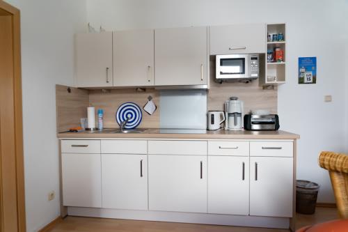 Langeoog Ferienwohnung Inselhaus Ute - Petunie - Petunie