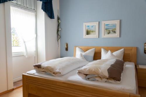 Langeoog Ferienwohnung Inselhaus Ute - Petunie - Petunie