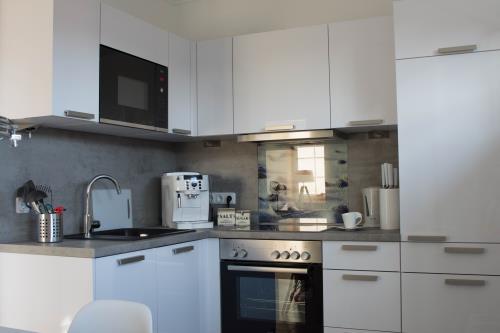 Langeoog Ferienwohnung Us Langeoog - Inselmädchen - Sandkiste - Ausstattung 9