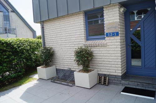 Langeoog Ferienhaus Inselresidenz Seeschwalbe FH**** - Haus Eingang