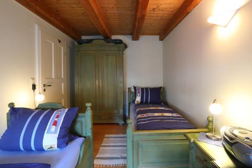 Langeoog Ferienwohnung Insulanerhaus Lüttje Pad 1 Solten Wind  - M 02 - Schlafzimmer 2