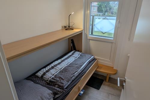 Langeoog Ferienwohnung Kajüte No. 3 - Otto-Leuß Weg - Einzelzimmer mit Bett