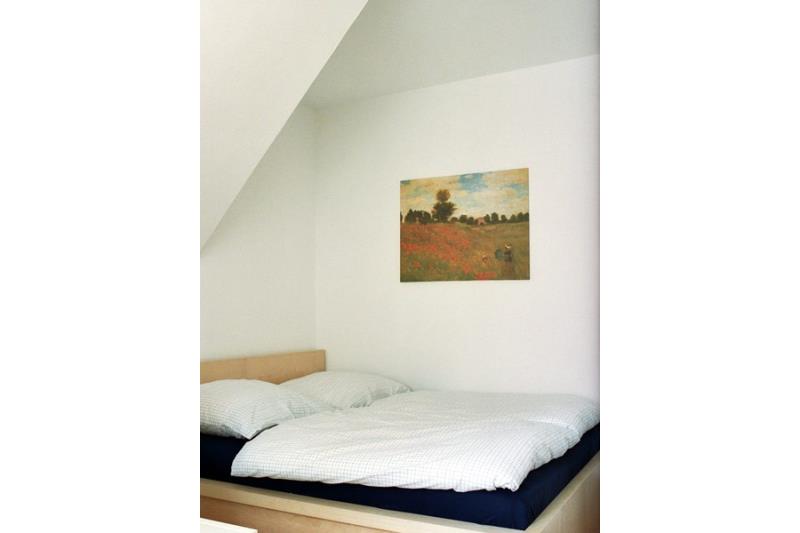 Langeoog Ferienwohnung Kiebitznüst Hübener - 1 Rosenbogen - Schlafzimmer