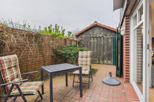 Langeoog Ferienwohnung Kiebitznüst Hübener - 1 Rosenbogen - CAM04236G0 PR0035 STILL015   online