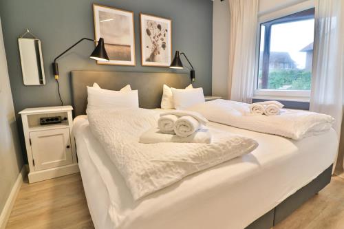 Langeoog Ferienwohnung Vermietung am Meer – Langeooger Viermaster - Blaues Segel - Schlafzimmer