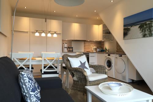 Langeoog Ferienwohnung Us Langeoog - Loog 53°N - Wohn- und Essbereich