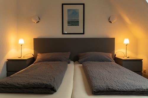 Langeoog Ferienwohnung Muschelsöker - KREBS & KRABBE - Schlafzimmer KRABBE