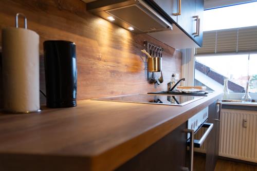 Langeoog Ferienwohnung Muschelsöker - KREBS & KRABBE - Küche KREBS