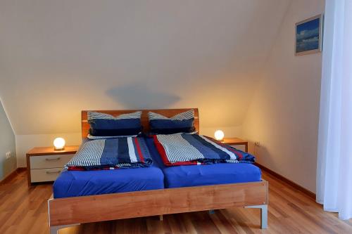 Langeoog Ferienhaus Residenz Inseltraum (Doppelhaushälfte) - Schlafen unter&#39;m Dach/ smart-TV