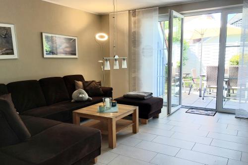 Langeoog Ferienhaus Residenz Inseltraum (Doppelhaushälfte) - geräumiges Wohnzimmer