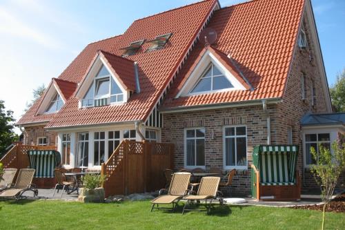 Langeoog Ferienhaus Residenz Otzum FH***** - Gartenansicht