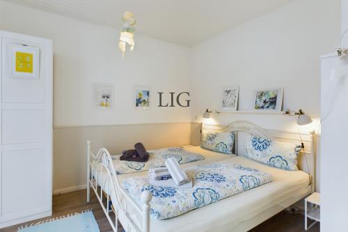 Langeoog Ferienwohnung Strandhaus - Herzmuschel - CAM04236G0 PR0020 STILL004