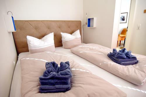 Langeoog Ferienwohnung Us Langeoog - Strandkörbchen - 09 FEWO Strandkoerbchen Schlafzimmer 01 