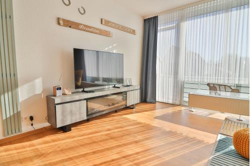 Langeoog Ferienwohnung Vermietung am Meer – Strandleben - Wohnzimmer