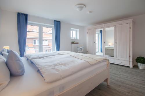 Langeoog Ferienhaus Strandvillen Langeoog - Hus in Lee - Hus in Lee, 1. OG: Doppelzimmer