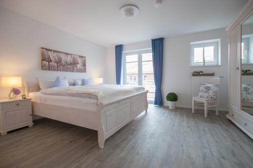 Langeoog Ferienhaus Strandvillen Langeoog - Hus in Lee - Hus in Lee, 1. OG: Doppelzimmer