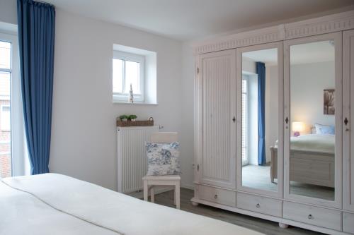 Langeoog Ferienhaus Strandvillen Langeoog - Hus in Lee - Hus in Lee, 1. OG: Doppelzimmer