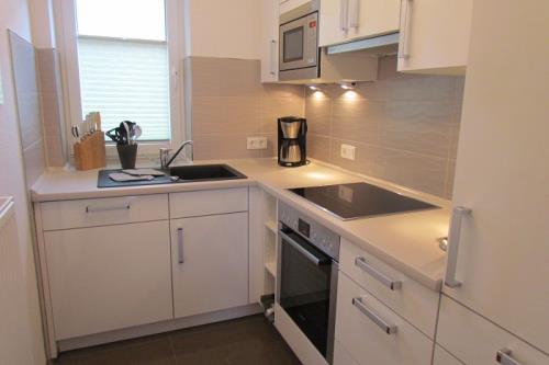 Langeoog Ferienhaus Strandvilla An´t Dünen - Haus 2 - Küche