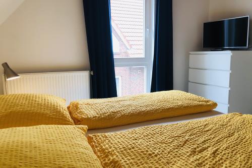 Langeoog Ferienwohnung Us Langeoog - Am Wall - Ferienhaus Renner - Ferienhaus Schlafzimmer 1