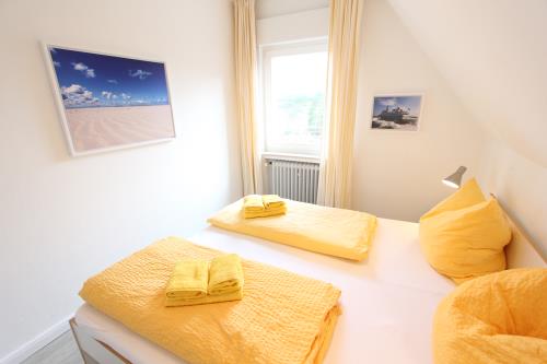 Langeoog Ferienwohnung Us Langeoog - Am Wall - Fewo Clas OG - Ferienwohnung Clas / OG Schlafzimmer