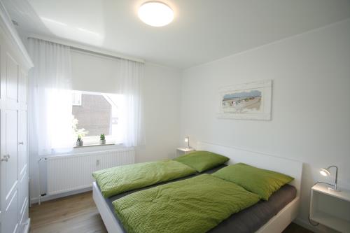Langeoog Ferienwohnung Us Langeoog - Barkhausenstraße - Mey - Mey Schlafzimmer