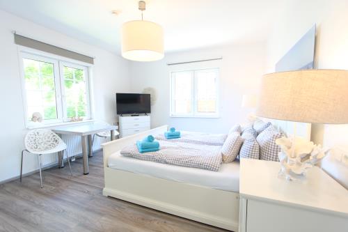 Langeoog Ferienwohnung Us Langeoog - Haus Stefanie - Stefanie 1 - 1 Schlafzimmer OG mit Doppelbett