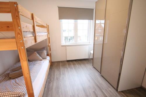 Langeoog Ferienwohnung Us Langeoog - Haus Stefanie - Stefanie 1 - 5. Schlafzimmer mit Etagenbett