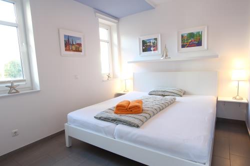 Langeoog Ferienwohnung Us Langeoog - Rudolf-Eucken-Weg - Dorfoase - Ausstattung 12