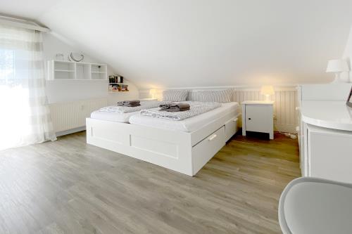 Langeoog Ferienwohnung Us Langeoog - Sonnendeck - Sonnendeck Schlafzimmer
