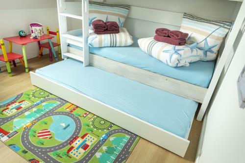 Langeoog Ferienhaus Villa Hafenkieker - SZ 3 Etagen- und Ausziehbett