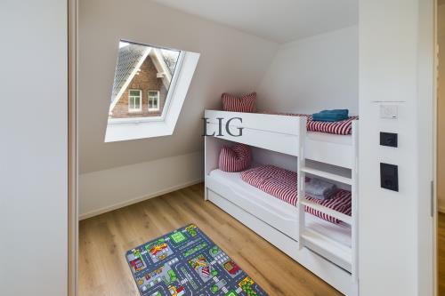 Langeoog Ferienhaus Villa Inselwind - CAM04236G0 PR0014 STILL019