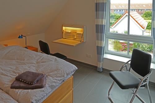 Langeoog Ferienhaus Captain&#39;s Langeoog - 1. OG Doppelzimmer, Arbeitsplatz