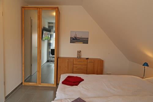Langeoog Ferienhaus Captain&#39;s Langeoog - 1. OG: Doppelzimmer - gespiegelt