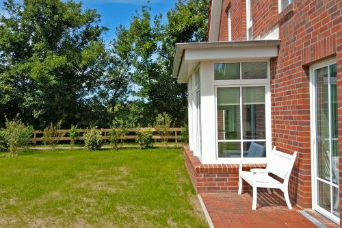 Langeoog Ferienhaus Captain&#39;s Langeoog - Westseite: Blick Richtung Ententeich