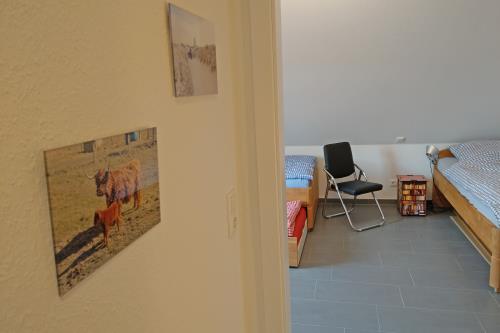 Langeoog Ferienhaus Captain&#39;s Langeoog - 1. OG: Wegweiser zum Dreier