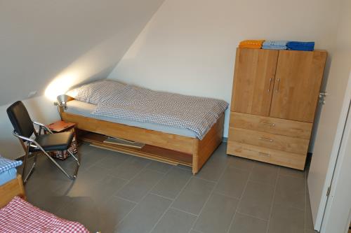 Langeoog Ferienhaus Captain&#39;s Langeoog - 1. OG: Dreier, gemütliches Eck