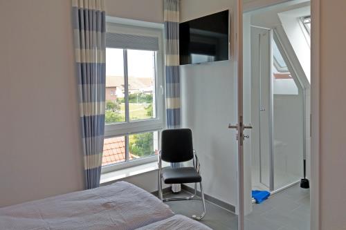 Langeoog Ferienhaus Captain&#39;s Langeoog - 2. OG: Suite mit Unterhaltung